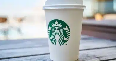 A starbucks coffee cup